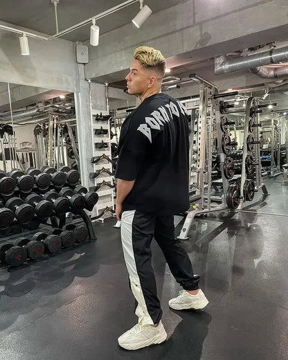 Coupe ample hommes été automne sport T-Shirt Fitness basket-ball à manches courtes élastique haut décontracté en Style coréen grande taille